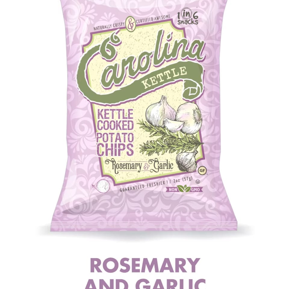 A bag of Carolina Kettle Rosemary & Garlic potato chips with garlic and rosemary illustrations.