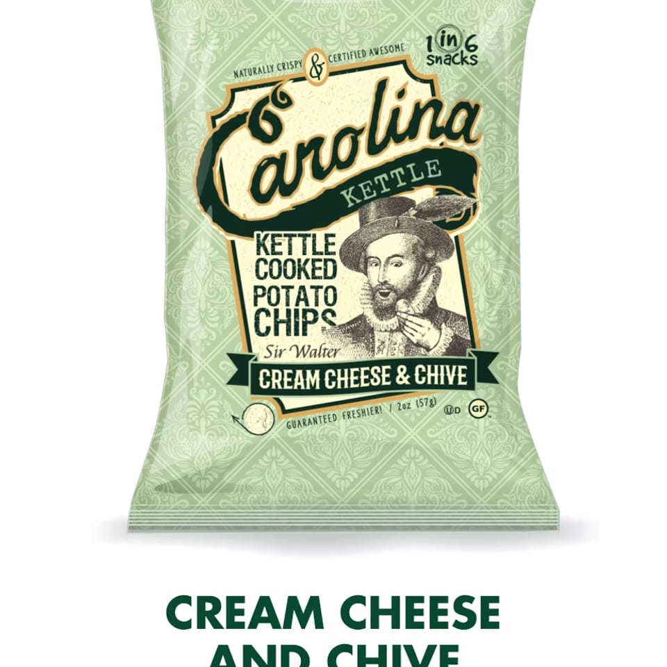 A bag of Carolina Kettle Cream Cheese & Chive potato chips featuring Sir Walter Raleigh.